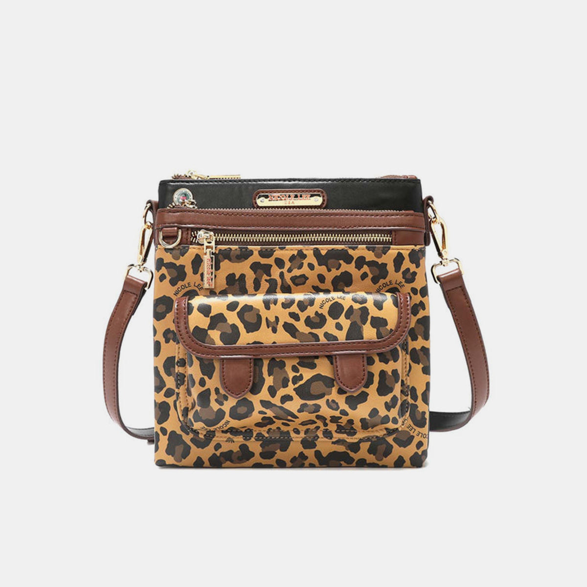 The Nicole Lee USA Leopard crossbody bag is made from vegan leather and showcases a leopard print design. It features a front pocket, a zippered closure, gold-tone hardware, brown trim, and a black panel at the top that is embellished with a brand label.