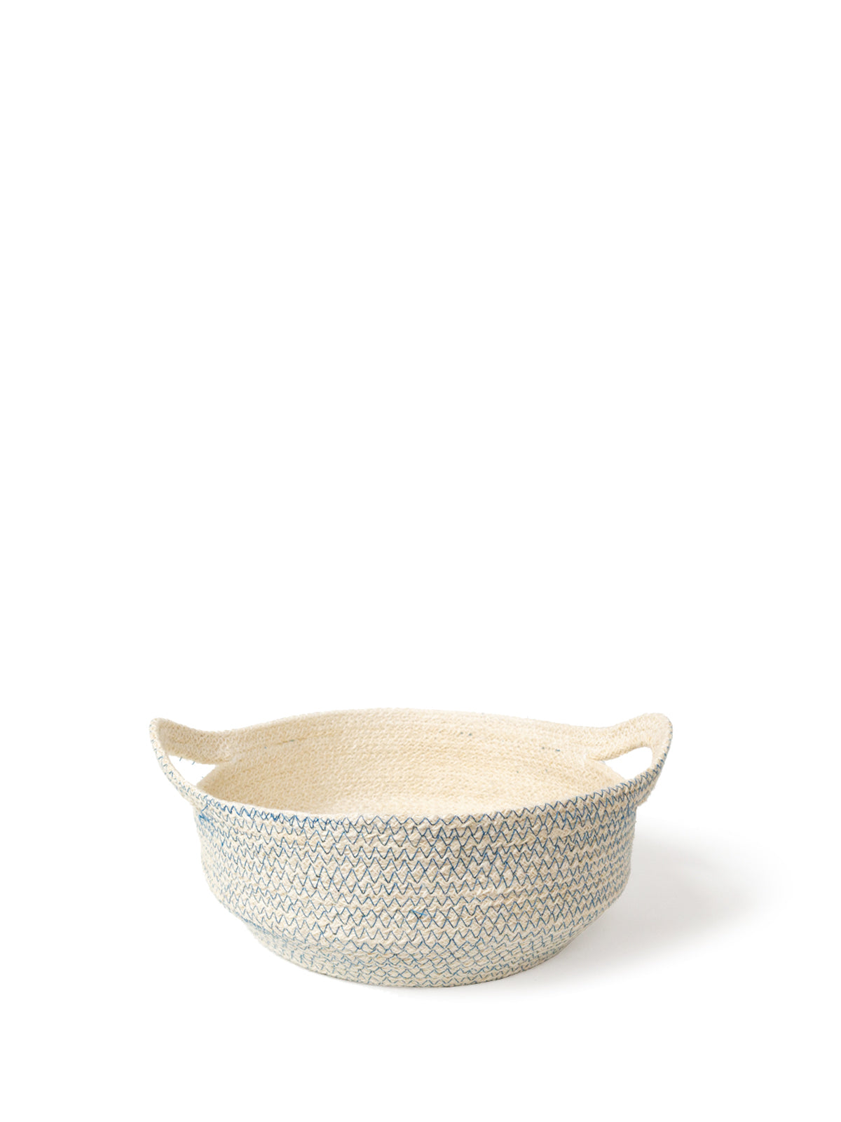 The Amari Fruit Bowl - Blue, handwoven by Fair Trade artisans, is artfully arranged on a plain background. Crafted sustainably with side handles, these baskets in varying sizes offer both beauty and functionality.