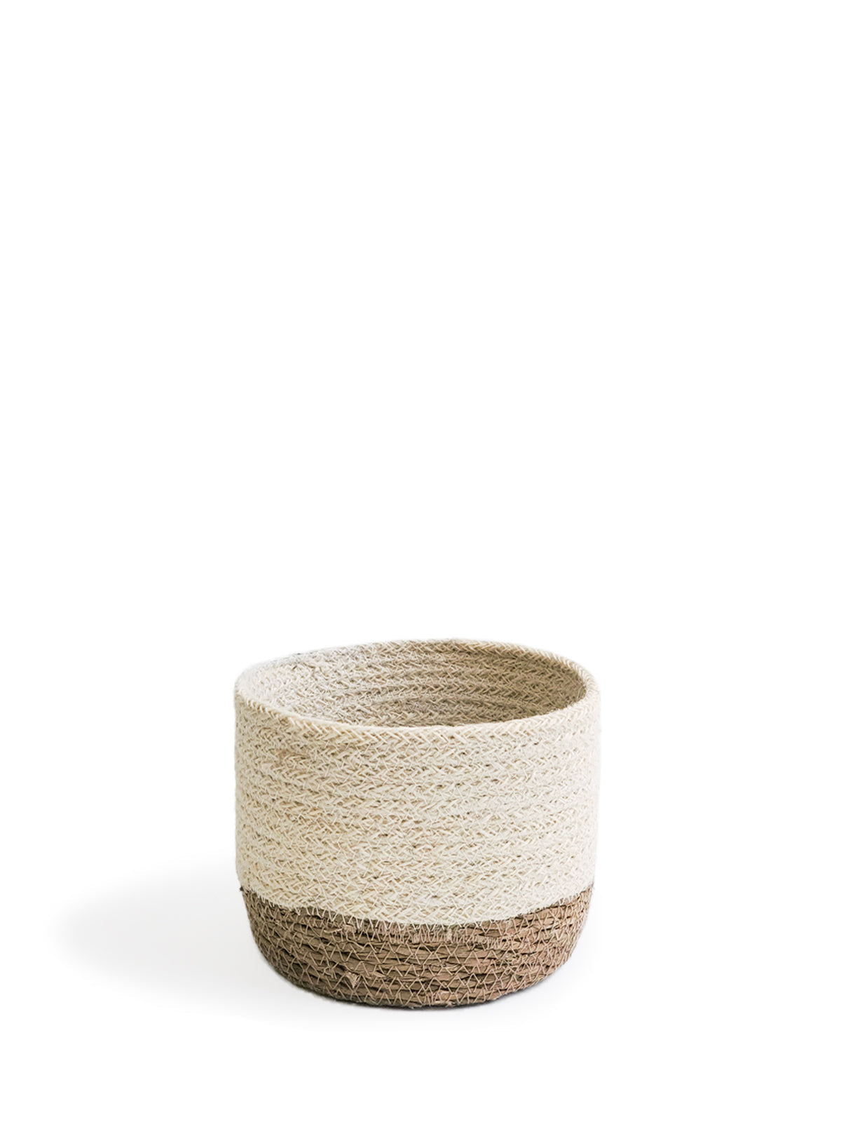 Three Savar Bins, round and handmade from natural seagrass by Fair Trade artisans, are displayed in a row from smallest to largest against a plain white background.