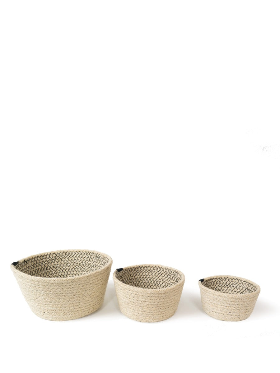 Amari Bowl - Black (Set of 3) features a minimalistic design with three beige woven baskets in different sizes, accented by black bands, crafted by Fair Trade artisans.