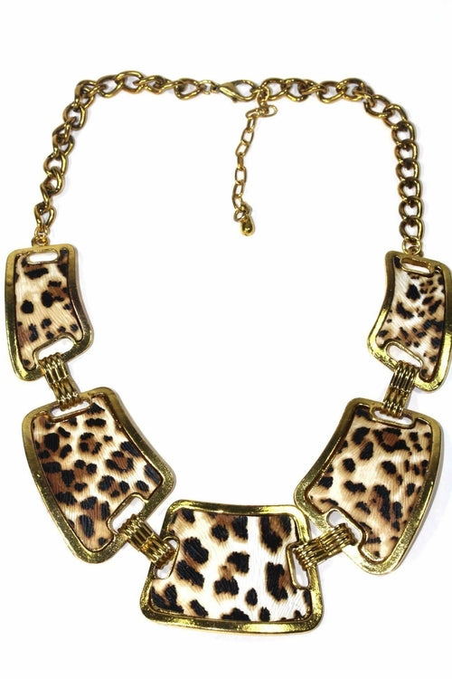 A striking leopard design in an antique gold tone with hook closures, featured in the Leopard Design Pendant Necklace Set, set against a plain white background.