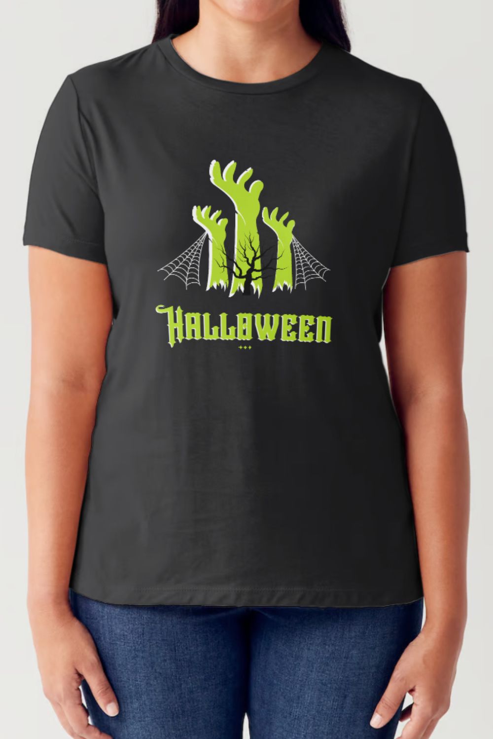 A person wearing the Simply Love Full Size HALLOWEEN Graphic Short Sleeve Tubular T-Shirt, which features a seamless tubular design in white adorned with green graphics of tree branches, spider webs, and the word "Halloween" in green text.