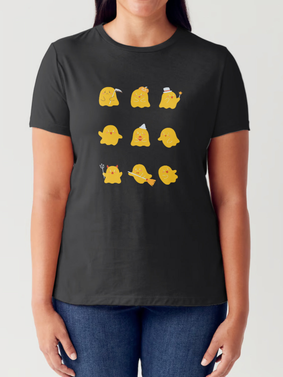 A person wearing a Simply Love Full Size Ghost Graphic Round Neck Short Sleeve Tubular T-Shirt featuring illustrations of nine different Gudetama characters in various costumes and poses.