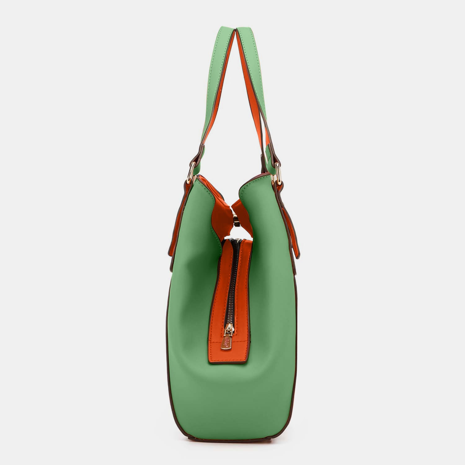 Nicole Lee USA Contrast Polka Dot Handbag made of vegan leather, featuring a green and white polka dot design, an "I LOVE NIKKY" text pattern, and a vibrant orange interior lining.