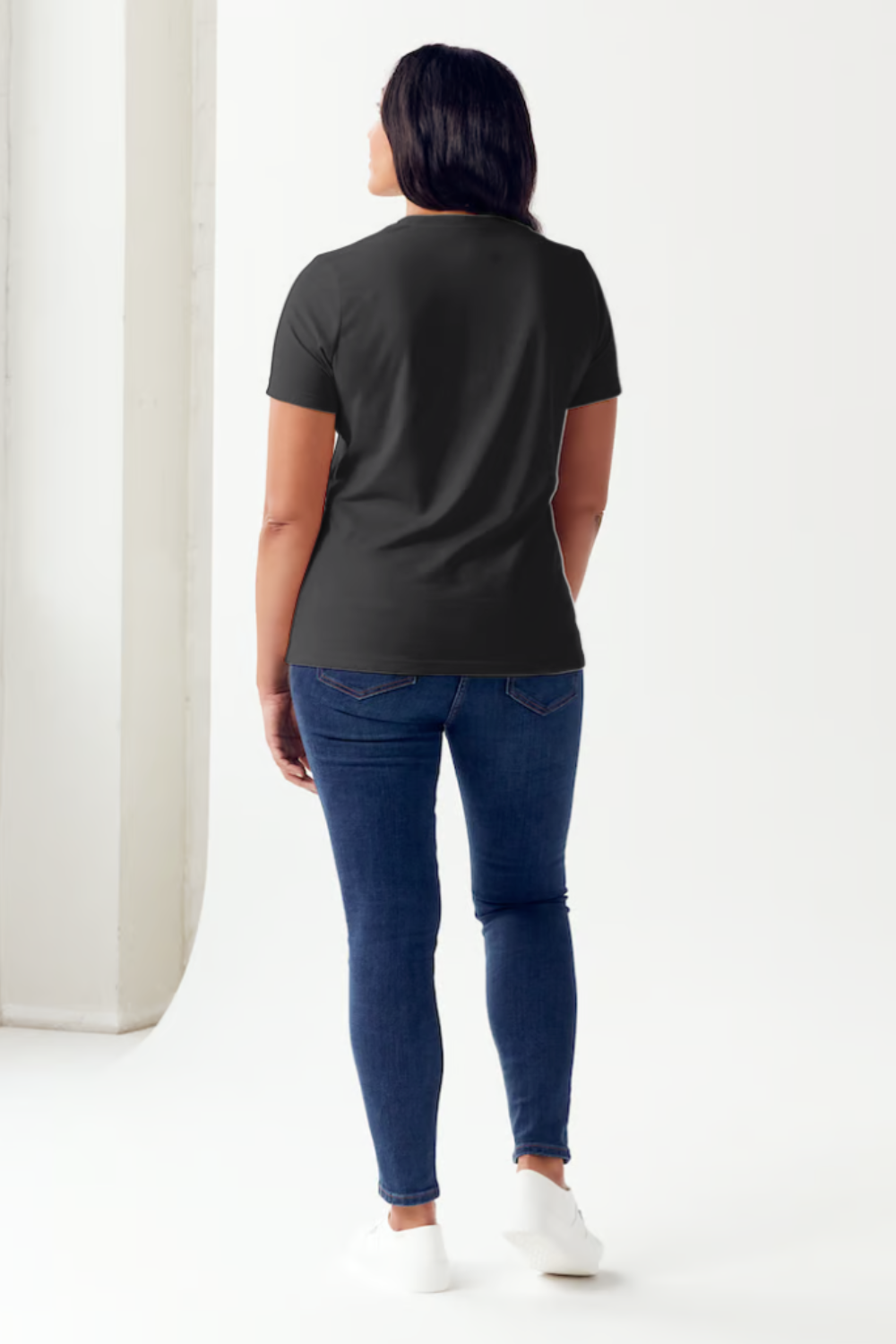 A person is wearing the Simply Love Full Size LONG LIVE COWGIRLS Short Sleeve Tubular T-Shirt, featuring a black illustration of a woman in a cowboy hat and the text "Long Live Cowgirls Yee Haw," showcasing iconic western style in comfortable fabric.