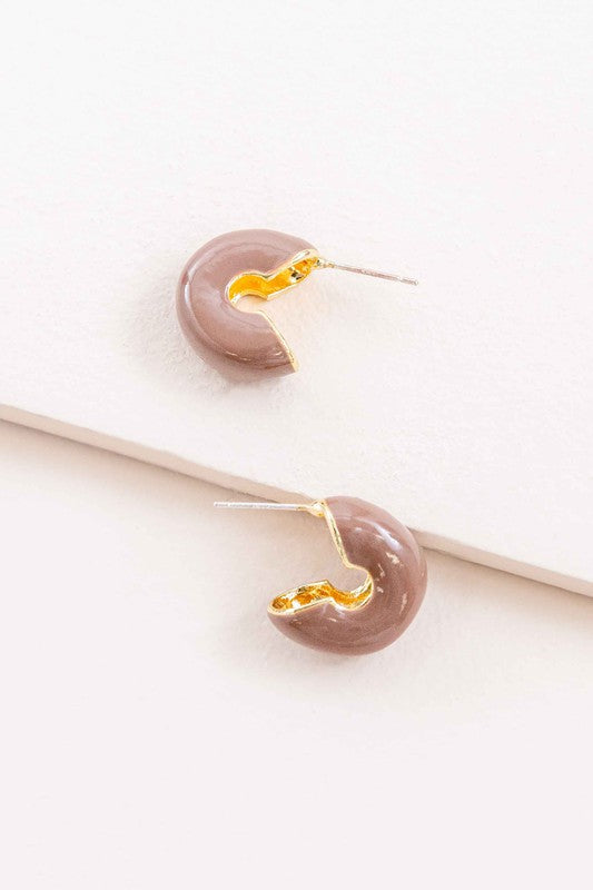 A pair of Thick Mini Hoop Earrings displayed on a white background.