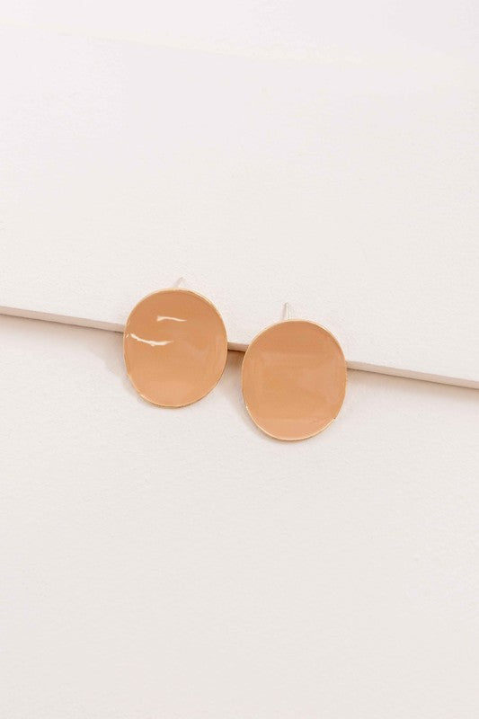 Round beige On a Curve stud earrings with a gold rim on a thin line against a white background.