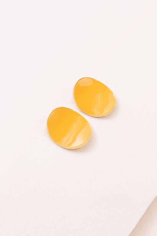 Round beige On a Curve stud earrings with a gold rim on a thin line against a white background.