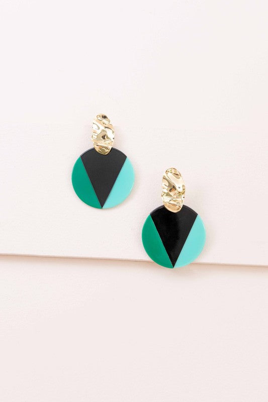 A pair of Color Block Drop Earrings with gold-tone hardware and geometric black and teal design.