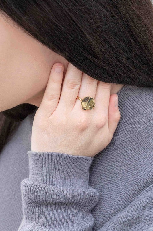 14k Gold Hammered Circle ring with a heart-shaped design on a white background.