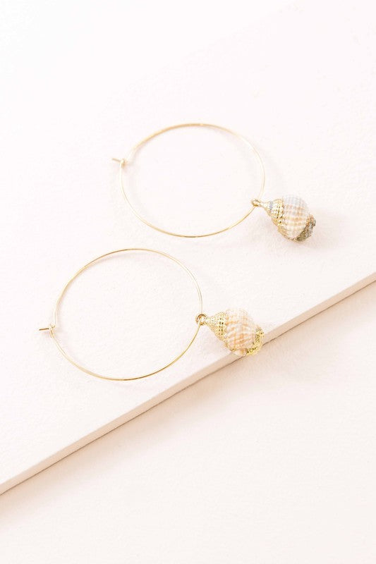 Ocean Calls Hoop Earrings - 14K with conch shell pendants against a white background.