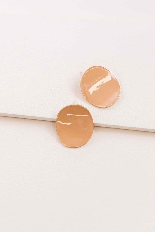 Round beige On a Curve stud earrings with a gold rim on a thin line against a white background.