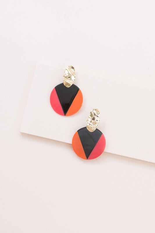 A pair of Color Block Drop Earrings with gold-tone hardware and geometric black and teal design.