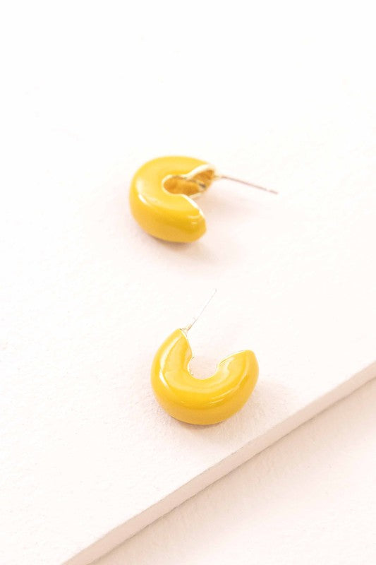A pair of Thick Mini Hoop Earrings displayed on a white background.