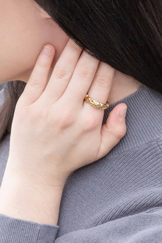 Gold Textured Ring on a plain white background.