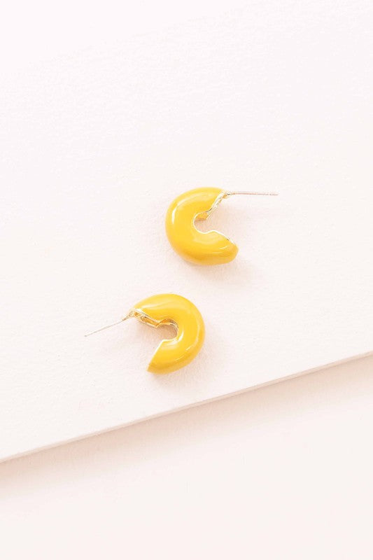 A pair of Thick Mini Hoop Earrings displayed on a white background.