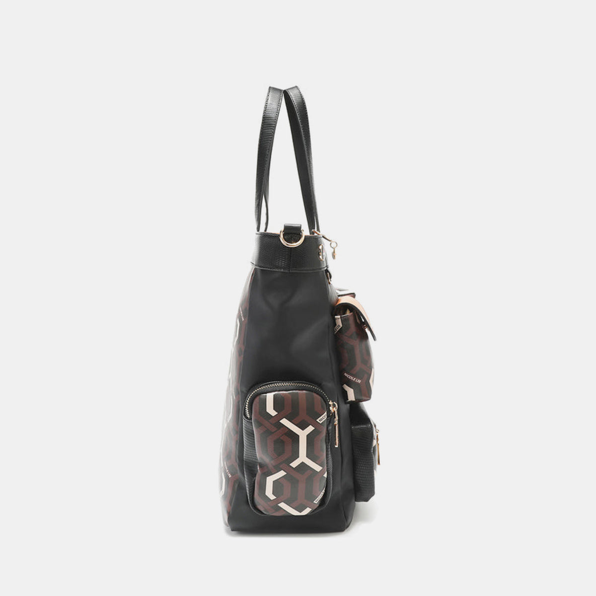 Introducing the Nicole Lee USA Geometric Pattern Tote Bag, a spacious accessory made from vegan leather with a striking black body, adorned with brown and white geometric patterned pockets, complemented by a brown flap pocket and black handles.