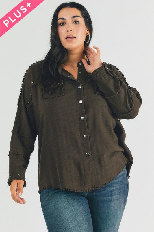 A person with dark hair wearing a Plus Distressed Hem Button Down Oversize Shirt and jeans stands against a light background, embodying casual comfort.