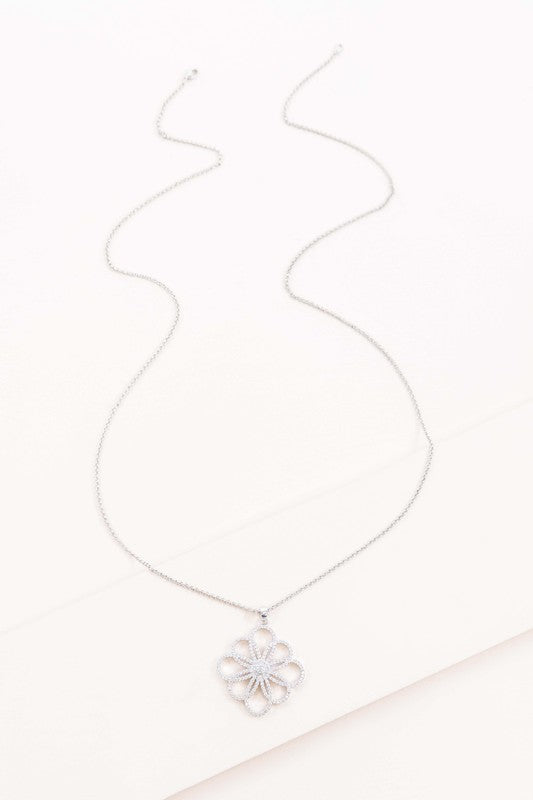 Floral Outline Pendant Necklace with a floral pendant on a white background, now featuring an 18K white gold-plated silver pendant.