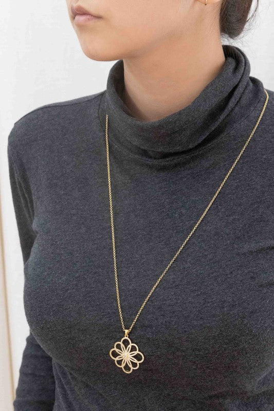 Floral Outline Pendant Necklace with a floral pendant on a white background, now featuring an 18K white gold-plated silver pendant.