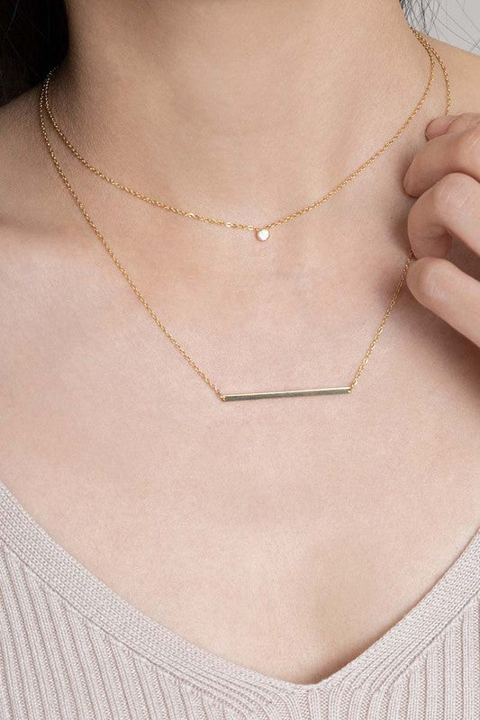 Modern Minimalist Bar Necklace 14K on a white background.
