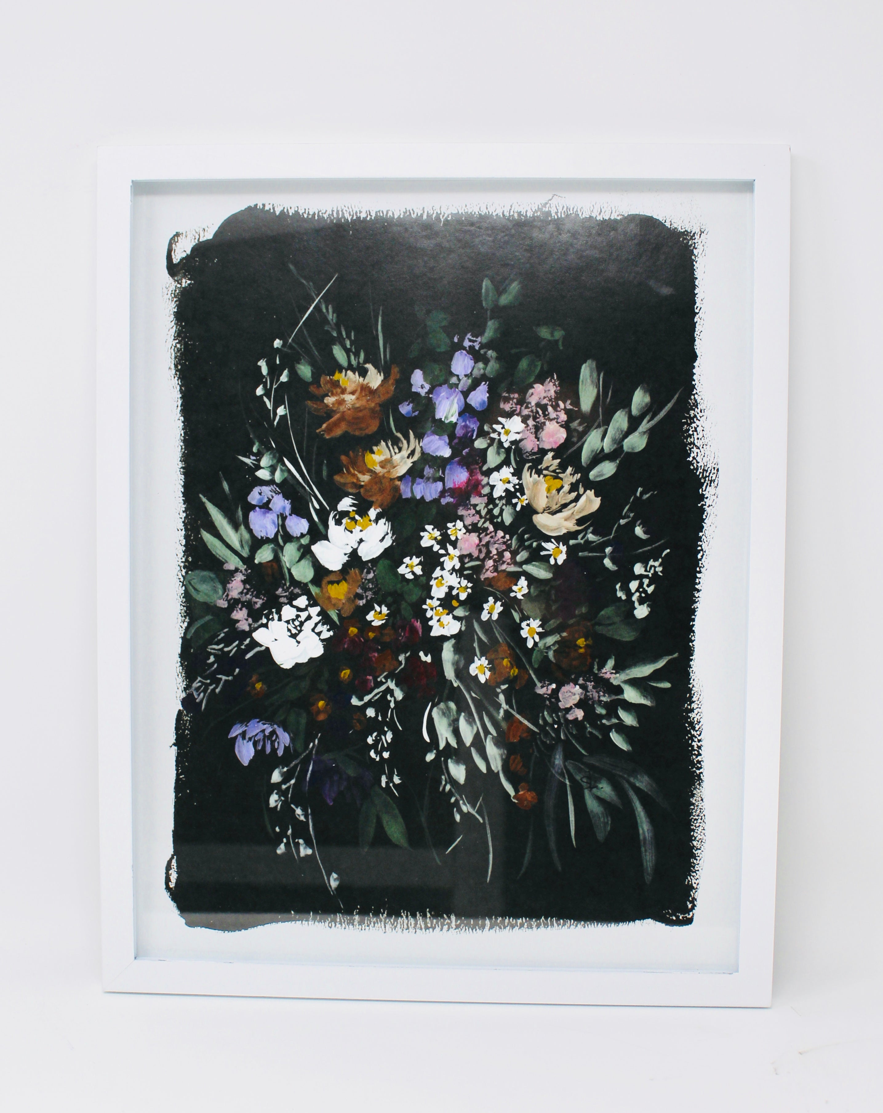 This elegant print, part of the Posy Collection – Spring Wildflower Floral, showcases a colorful floral arrangement against a black background in a white frame. It adds a touch of sophistication and charm to your home decor.