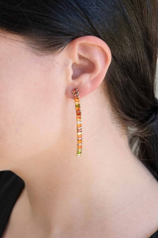 A whimsical, Candy Stone Dangle Earrings and bracelet set on a white background.