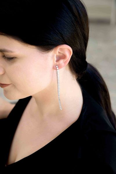 A pair of Evening Gala Ear Jacket Earrings displayed on a white surface.