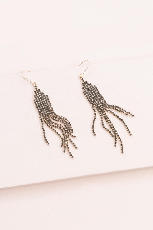 Pixel Stone dangle beaded tassel earrings displayed on a white background.