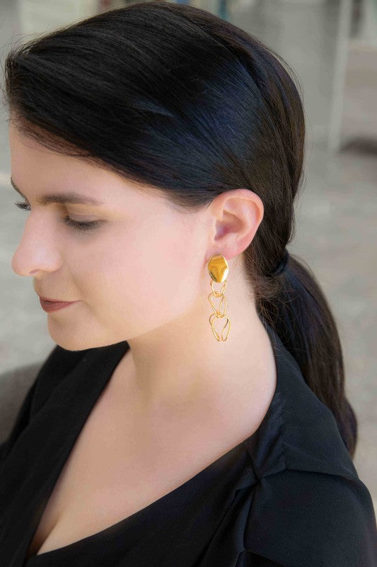 Get Jiggy Chain Earrings displayed on a white surface.