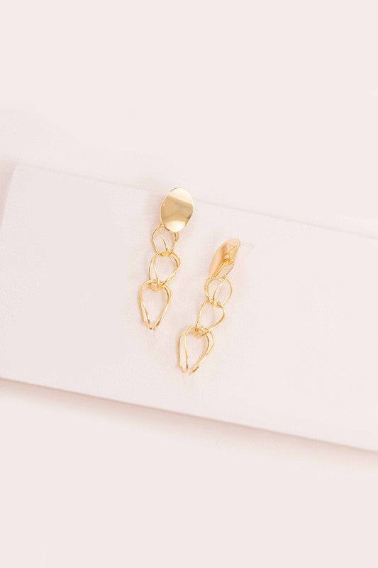 Get Jiggy Chain Earrings displayed on a white surface.