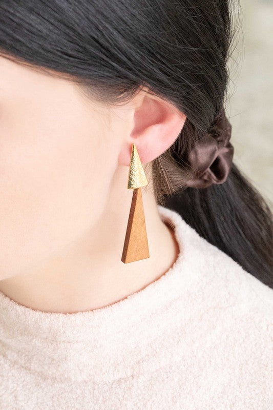 Two paper airplanes and Double Triangular Drop Earring on a white background.