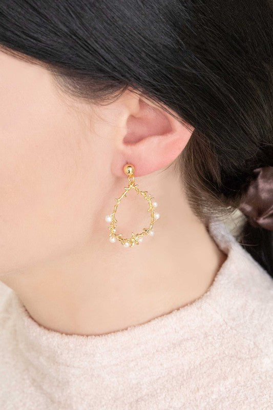 Floral and Pearl Vine Tear Earrings with small pearl bead embellishments on a white background.