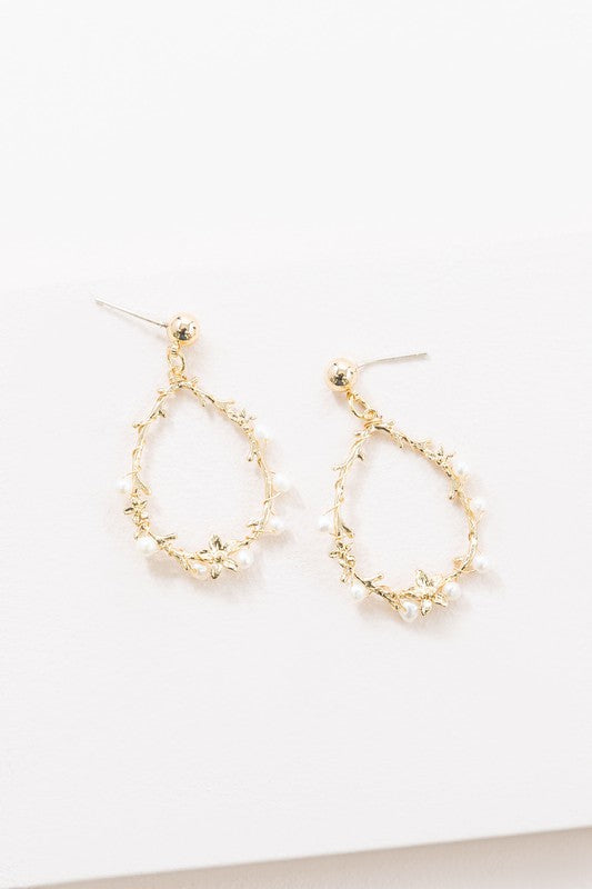 Floral and Pearl Vine Tear Earrings with small pearl bead embellishments on a white background.