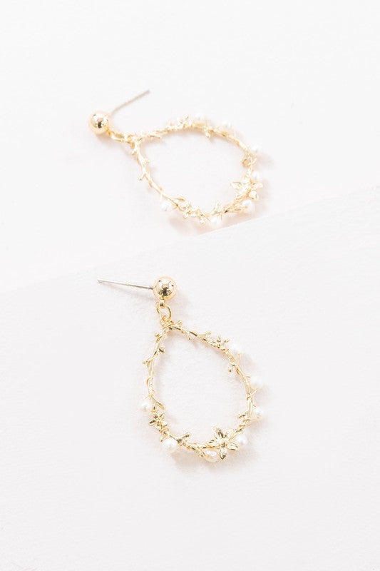 Floral and Pearl Vine Tear Earrings with small pearl bead embellishments on a white background.