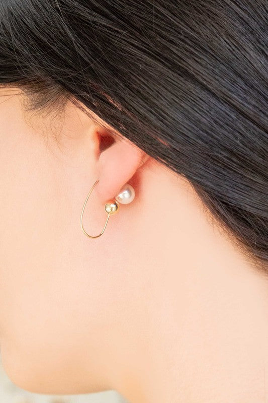 Pearl Hoop Earrings with 14k Gold plate accents on a white background.