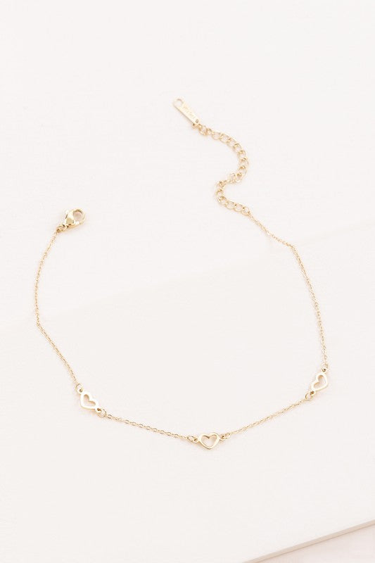With Love Anklet heart-themed bracelet on a white background.