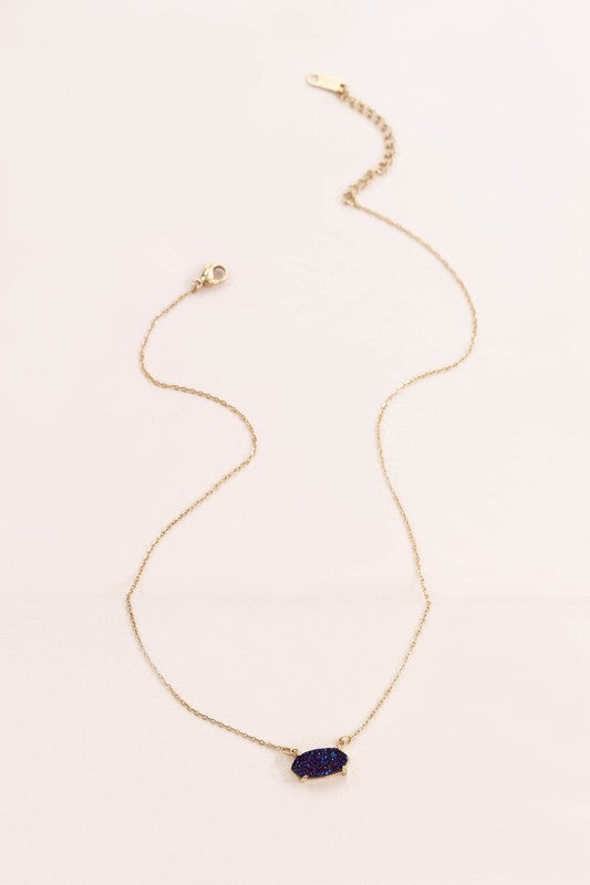 Marquise Druzy Necklace with a blue gemstone pendant on a white background.