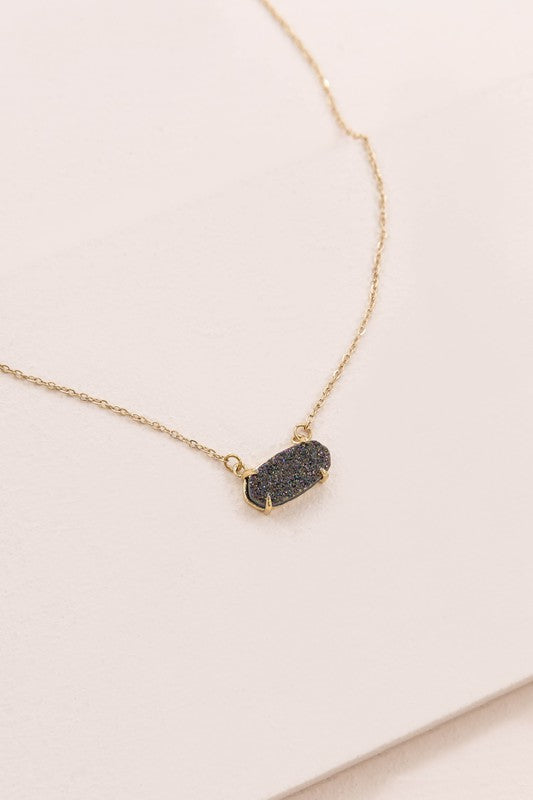 Marquise Druzy Necklace with a blue gemstone pendant on a white background.