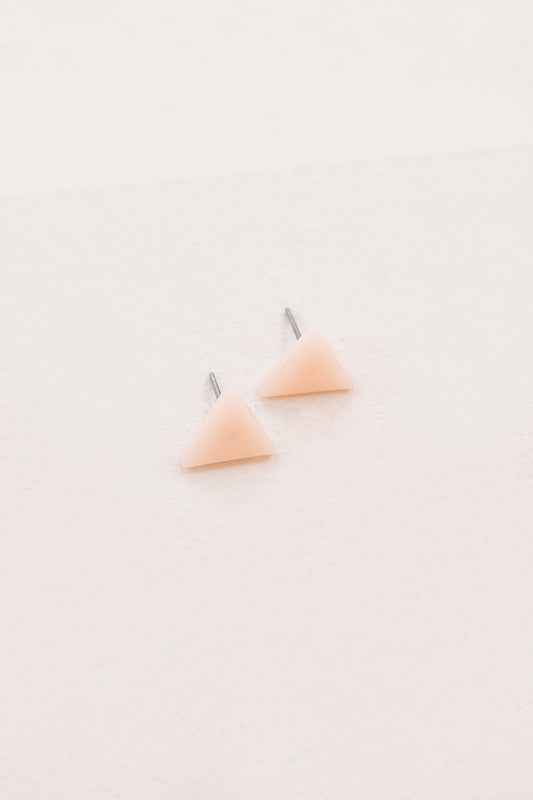 Two small Porsha Triangle Stud Earrings on a white background.
