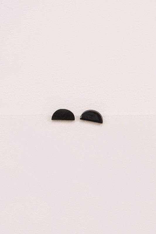 Pair of Porsha Semi Circle Stud Earrings on a white background.