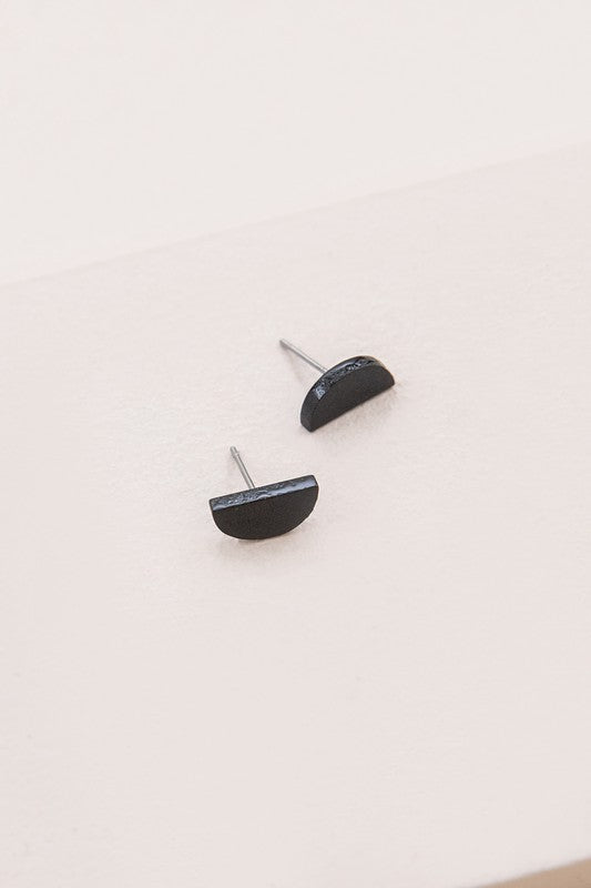 Pair of Porsha Semi Circle Stud Earrings on a white background.
