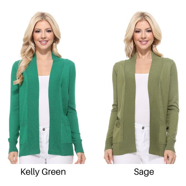 A person wearing a light yellow Open Front Shrug Sweater Knit Cardigan over a white shirt is standing against a white background.