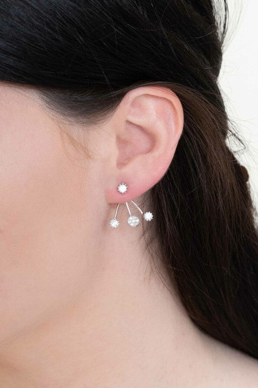 Pair of Quad Jacket constellation earrings on a white background.