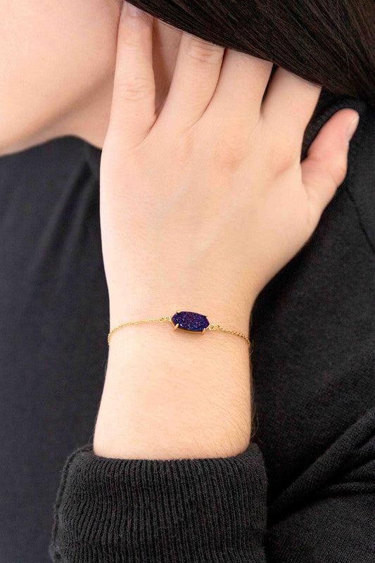 Marquise Druzy Bracelet with a 14k gold plated, rectangular, multicolored glitter pendant.