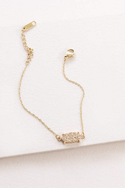 Marquise Druzy Bracelet with a 14k gold plated, rectangular, multicolored glitter pendant.
