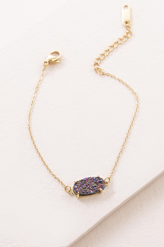 Marquise Druzy Bracelet with a 14k gold plated, rectangular, multicolored glitter pendant.