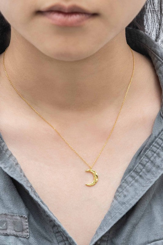 Crescent Moon Hammered Necklace on a delicate chain against a white background.