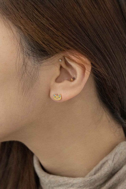 A pair of gold-plated cat-shaped stud earrings on a white background.