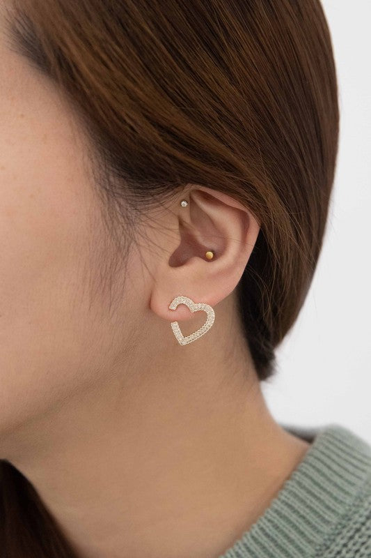 A Pair of Hearts Earrings with a dangling rhinestone detail and 14k Gold Plating on a white background.